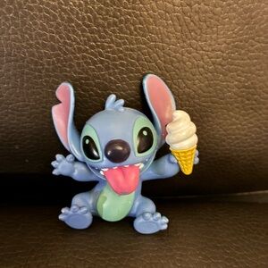 Disney Blue Stitch Figure with Pink Tongue and Yellow Ice Cream Cone